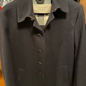 Men’s wool coat by Burberry . Like new . Only worn once . Size small